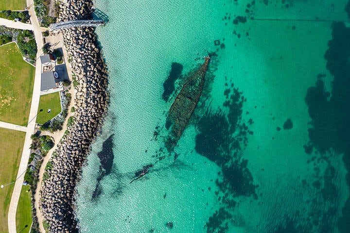 An aerial shot of the Omeo shipwreck at Port Coogee Marina, near Fremantle and Perth, Western Australia 