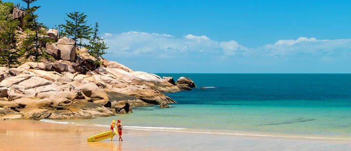 Calm surf and Lifeguard on empty beach at Magnetic island, Australia