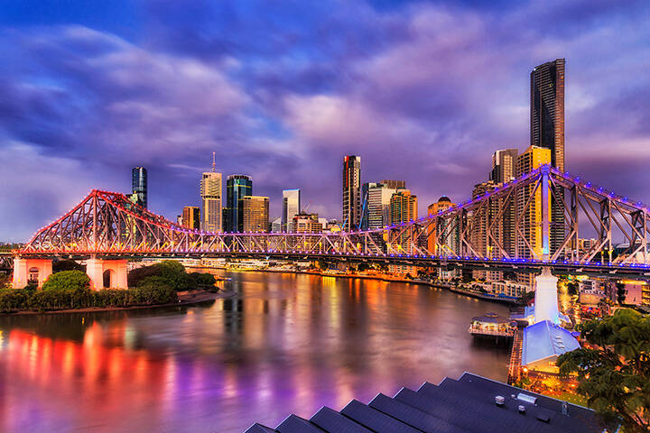 Brisbane city and river illuminated at night