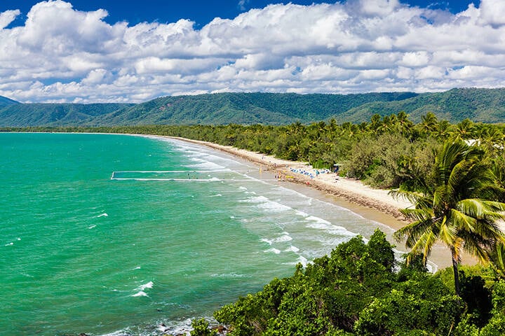 Port Douglas four mile beach and ocean on sunny day, Queensland, Australia