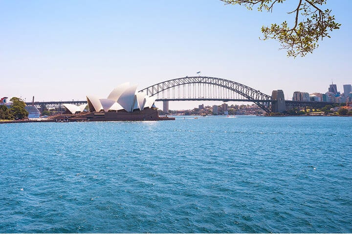 Scenic view of the Sydney Opera House and the Sydney Harbour Bridge from Mrs Macquaries Chair.  