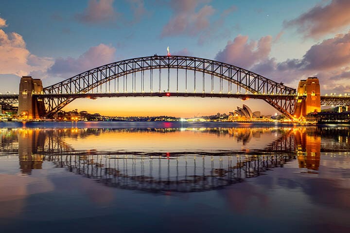 The Sydney Harbour Bridge, one of the most iconic landmarks of Sydney, during sunrise  
