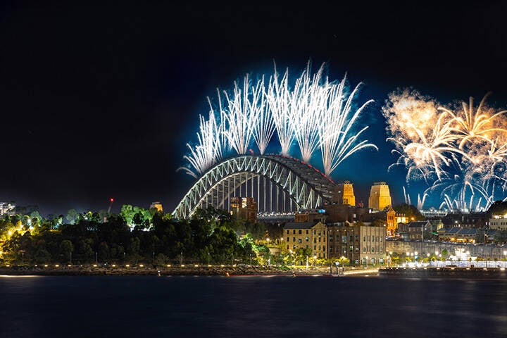 Sydney Harbour Bridge New Years Eve fireworks, colourful fire works lighting the night skies with vivid multi colours