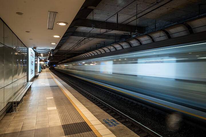 Train passing through Sydney Airport station at the domestic terminal 