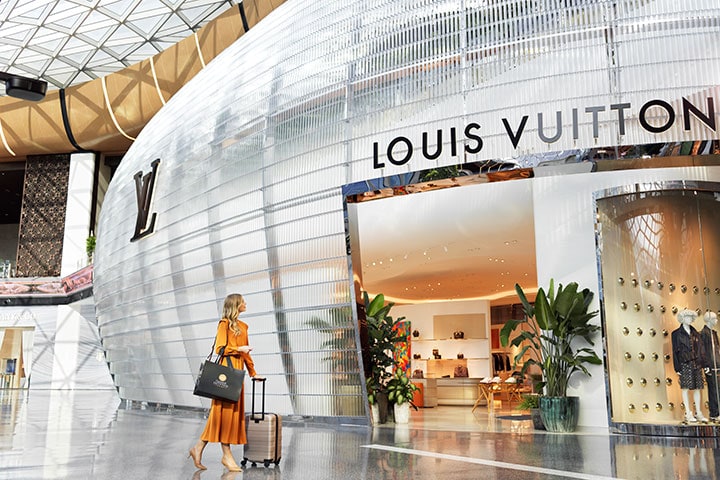 Woman shopping in Doha Airport in Qatar while in transit