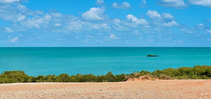 Crystal blue water from red dirt lookout