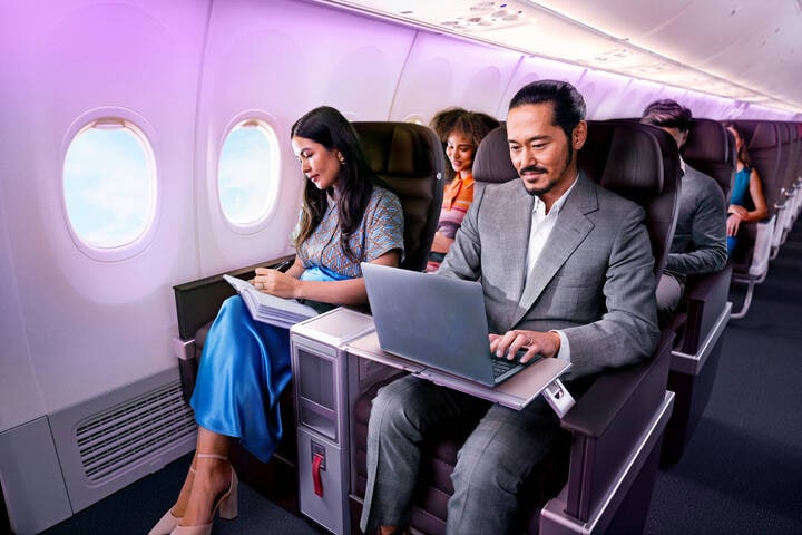 Virgin Australia Business Flyer passengers sitting in business class cabin