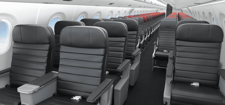Seats in business class cabin of E190-E2 jet interior