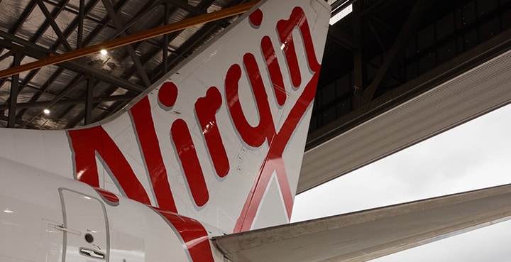 Virgin Australia tailfin in hangar