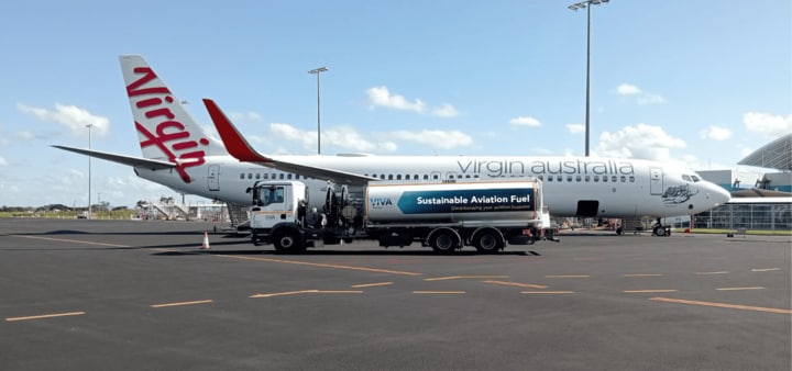 Virgin Australia aircraft on tarmac with Viva Energy to source Sustainable Aviation Fuel (SAF)