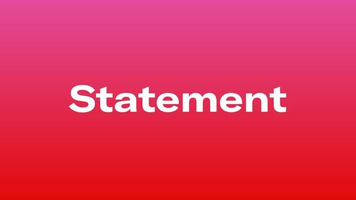 White text reading ‘Statement’ centered on a pink-to-red gradient background.